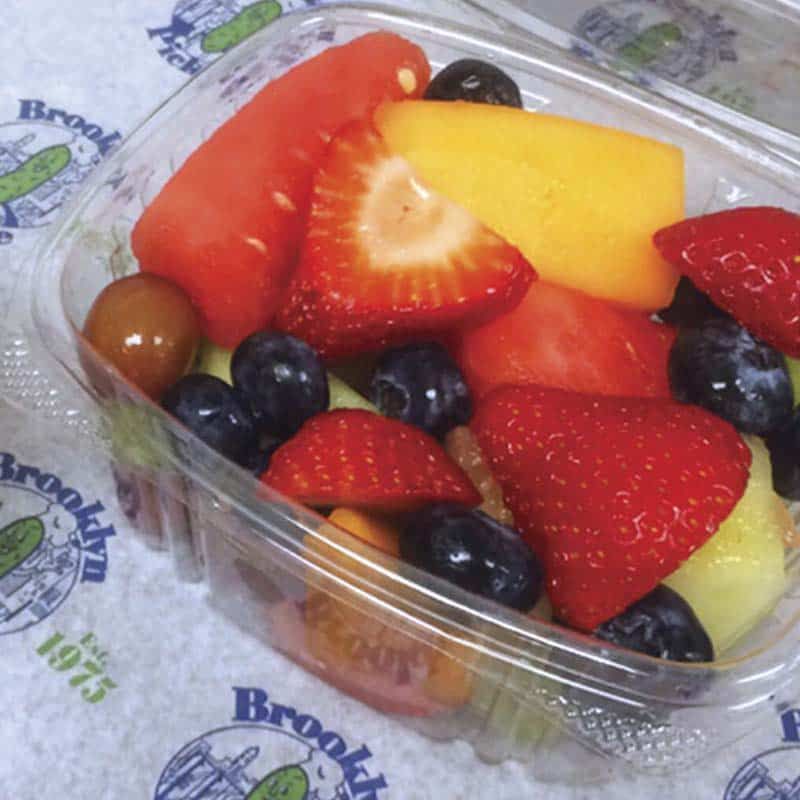 Fresh fruit cup with strawberries, pineapple, and blueberries