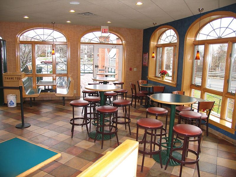 Syracuse East dining room with tall arched windows