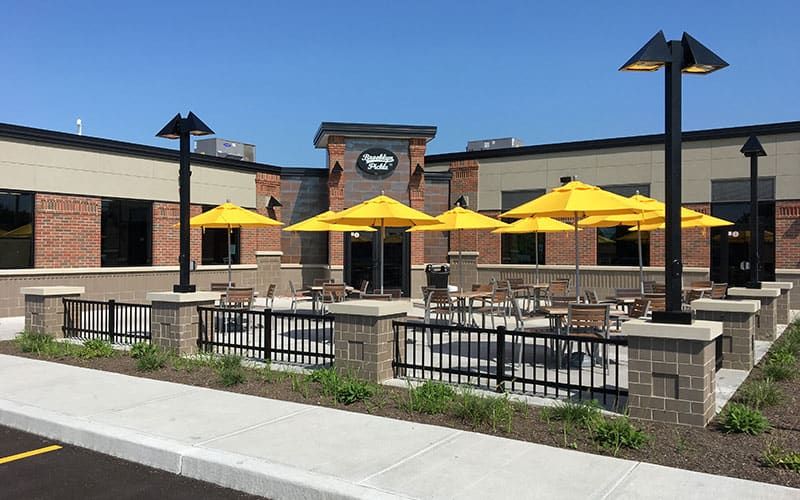 Brooklyn Pickle Liverpool on Buckley Road with yellow umbrellas on the patio